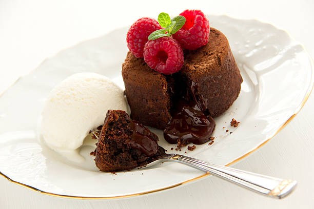 istock Chocolate fondant (pudding) with raspberries. 463633531