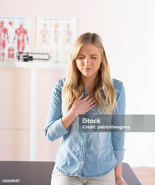 Girl In Doctors Office Ready To Describe Her Illness Stock Photo - Download Image Now