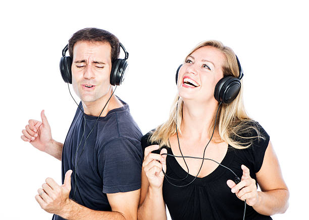 istock Couple Wearing Headphones Dancing 463644127