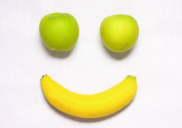 istock Smiling face from banana and apples 463646585