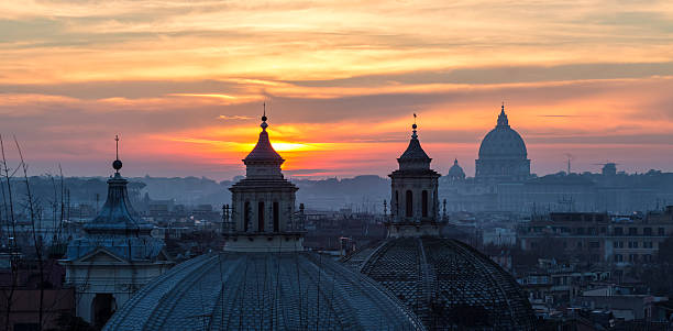 istock Cityscape with church cupolas at sunset, Rome Italy 463664449