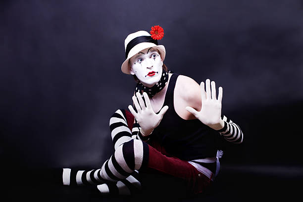 istock Theatrical mime in white hat 463679117