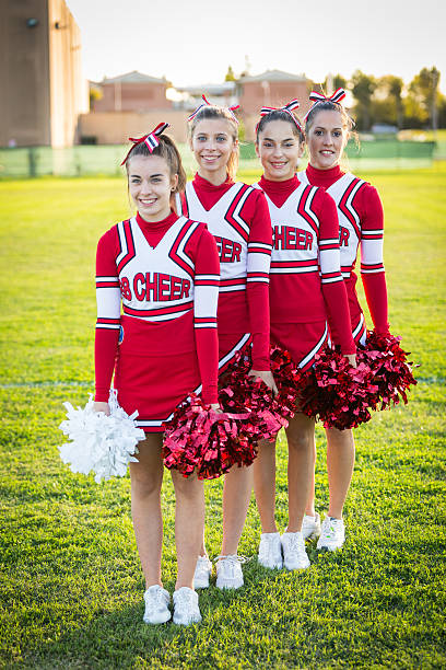istock Group of Cheerleaders in the Field 463679183