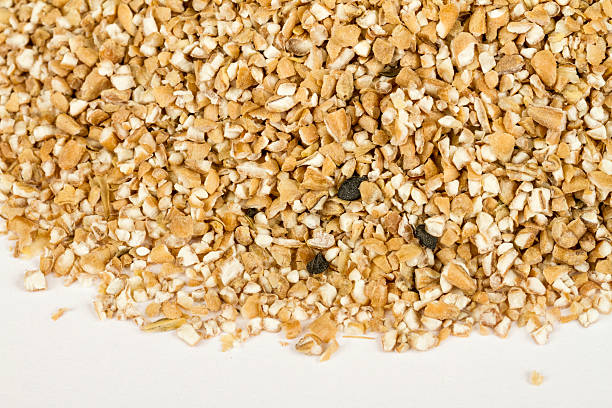 istock Pearl barley heap isolated on white 463692031