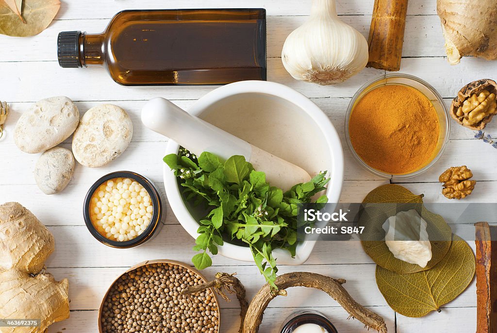 Still life herbs and spices on white wood table Dandelion Stock Photo