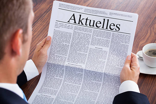 istock Businessman Reading Newspaper 463693463