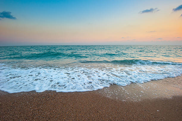 istock sea waves and sandy beach at dawn 463693973
