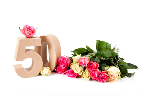 Number of age in a colorful birthday card surrounded with roses