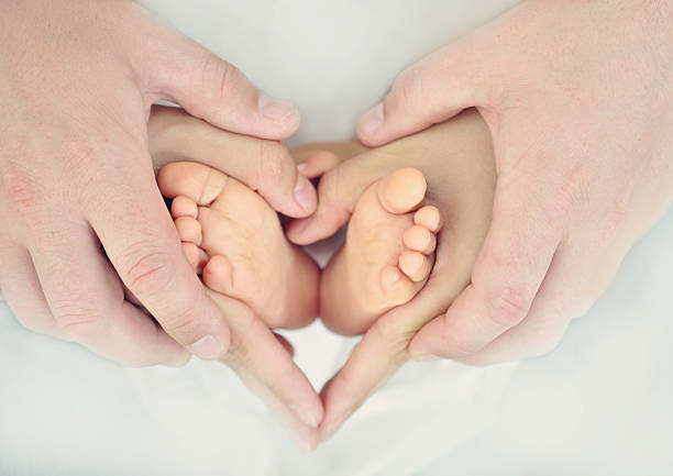 istock Baby's Feet In A Love Heart Shape - Valentine's Day 463697665