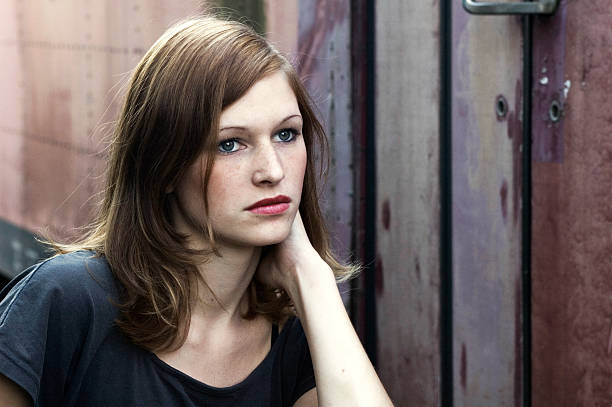 istock Woman and abandoned waggon 463716563