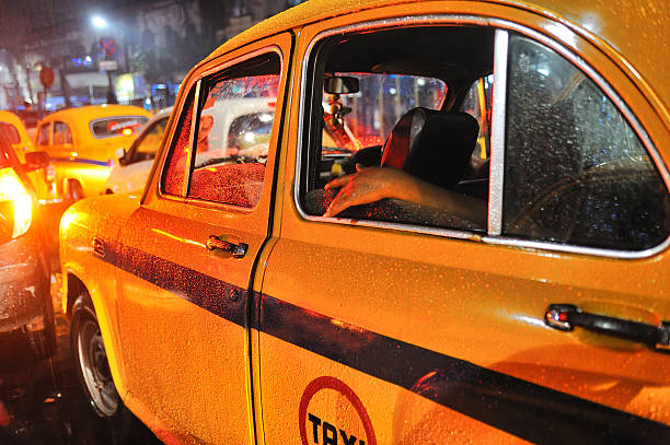 yellow cab yellow cabs in the jam kolkata night stock pictures, royalty-free photos & images