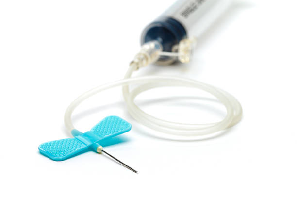 Intravenous Needle Intravenous Needle on a white background tracheotomy tubing stock pictures, royalty-free photos & images