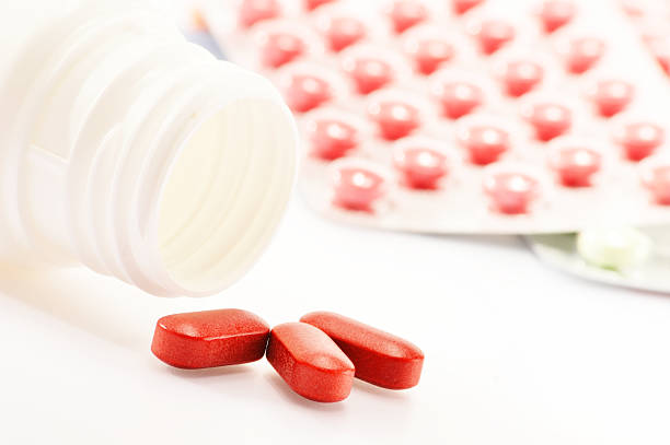 istock Composition with dietary supplement capsules and drug pills 463741683