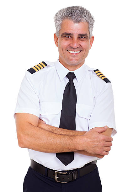 istock handsome senior airline captain with arms crossed 463745909
