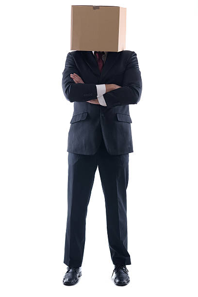 istock business man with an box on his head 463755443