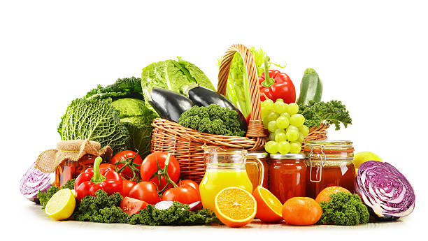 istock Wicker basket with assorted organic vegetables and fruits  isola 463758959