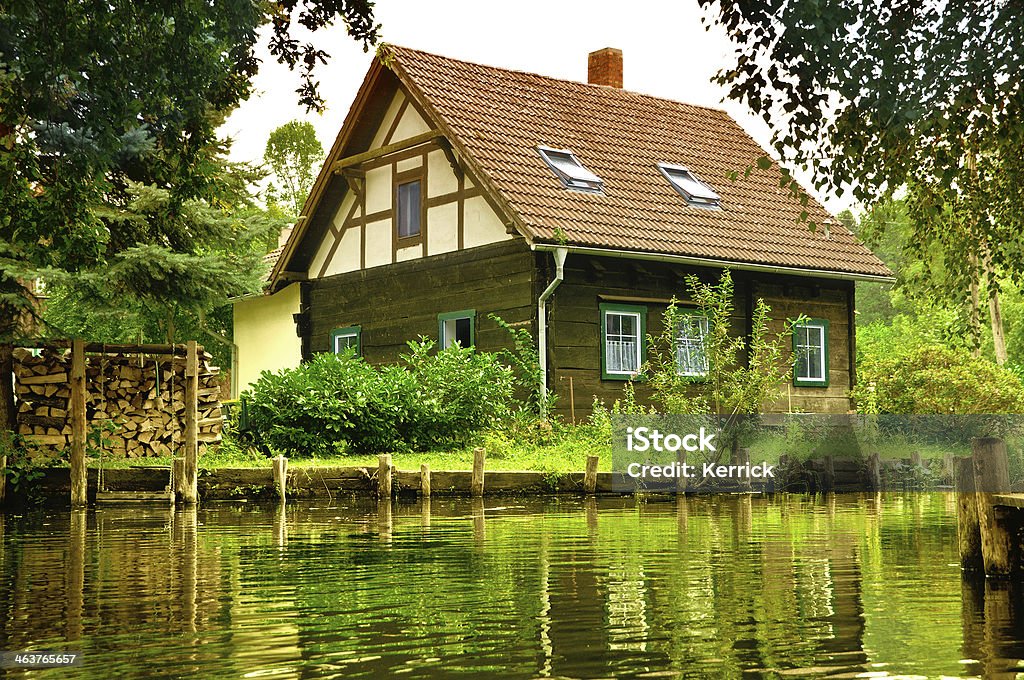 Apartment house in Spreewald /Germany Apartment house in Spreewald / Germany. Spreewald is a landscape around the river "Spree" in Germany which you can explore by boat. Its a tourist attraction. This house is part of this region.  House Stock Photo