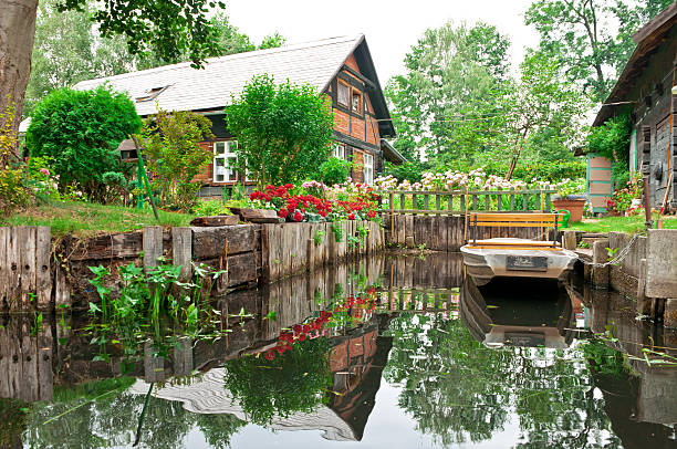 Apartment house in Spreewald /Germany Apartment house in Spreewald / Germany. Spreewald is a landscape around the river "Spree" in Germany which you can explore by boat. Its a tourist attraction. This house is part of this region.  spreewald stock pictures, royalty-free photos & images