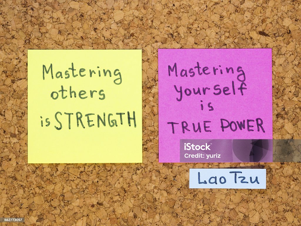 others and yourself famous Lao Tzu quote interpretation with sticker notes on cork board Bulletin Board Stock Photo