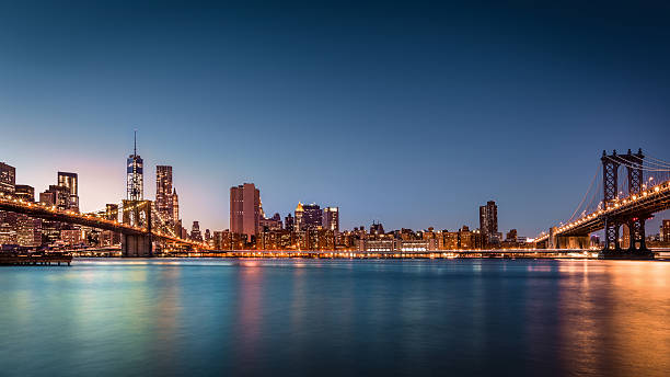 two bridges - new york stock exchange long exposure manhattan new york city zdjęcia i obrazy z banku zdjęć