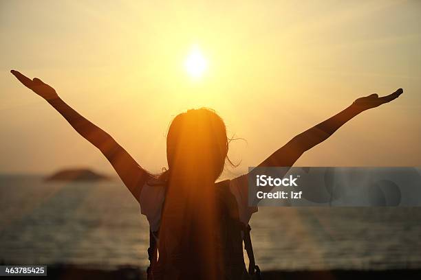 Cheering Hiking Woman Sunrise Seaside Stock Photo - Download Image Now - Active Lifestyle, Adult, Adults Only