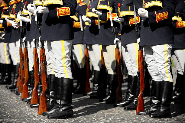 istock Soldiers in rifle rest position 463795333