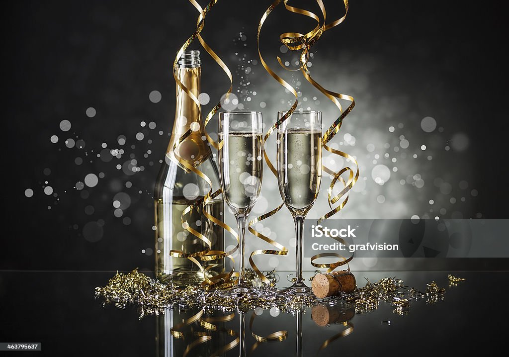 Glasses of champagne Glasses of champagne and bottle with festive background Alcohol - Drink Stock Photo