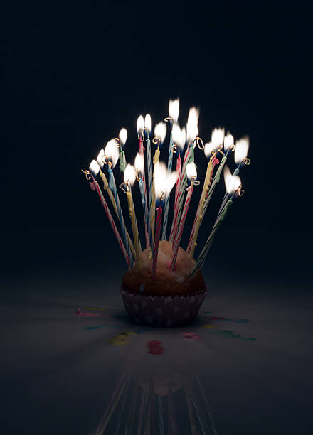 istock burning candles on a tartlet black 463796741