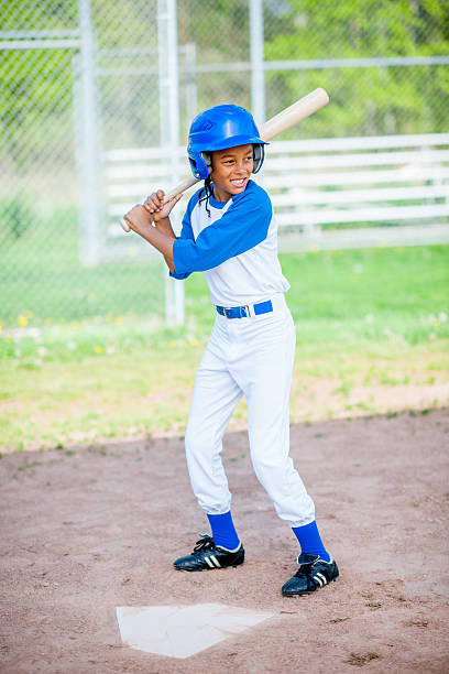 Little League Baseball Portrait of teen baseball player youth baseball and softball league photos stock pictures, royalty-free photos & images