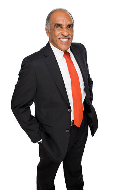 istock Smiling business executive with arms in pocket 463803801