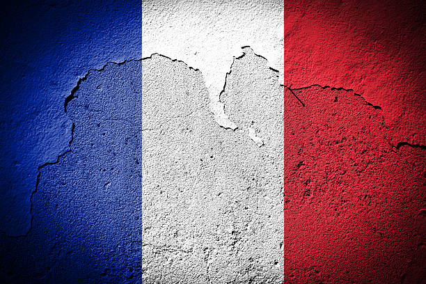 istock France flag on cracked wall 463804587