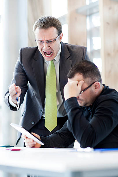 istock Angry businessman and his subordinate 463813199