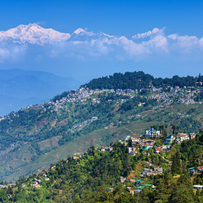 Panoramic view of Darjeeling with mount Kanchengjunga in the background. Kangchenjunga is the third highest mountain in the world, with an elevation of 8,586 m and located along the India-Nepal border in the Himalayas.