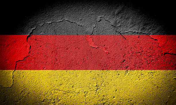 Germany flag on cracked wall stock photo