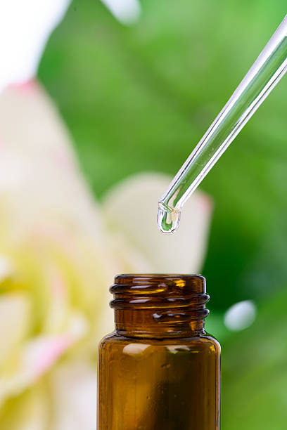 istock Essential Oil With Hibiscus Flowers 463833975