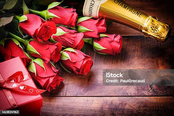 Valentines Setting With Red Roses Champagne And Gift Stock Photo - Download Image Now