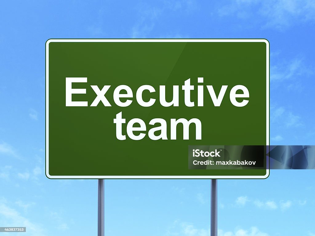 Business concept: Executive Team on road sign background Business concept: Executive Team on green road (highway) sign, clear blue sky background, 3d render Achievement Stock Photo