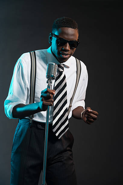 istock Retro african american jazz singer with microphone. 463845499