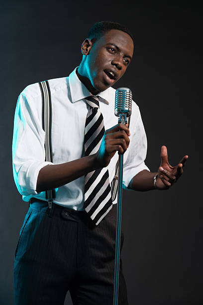 istock Retro african american jazz singer with microphone. 463845503