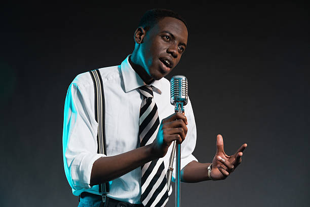 istock Retro african american jazz singer with microphone. 463845509