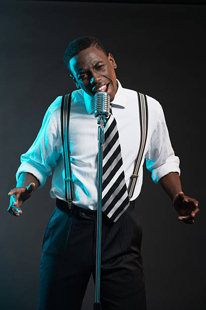 istock Retro african american jazz singer with microphone. 463845563