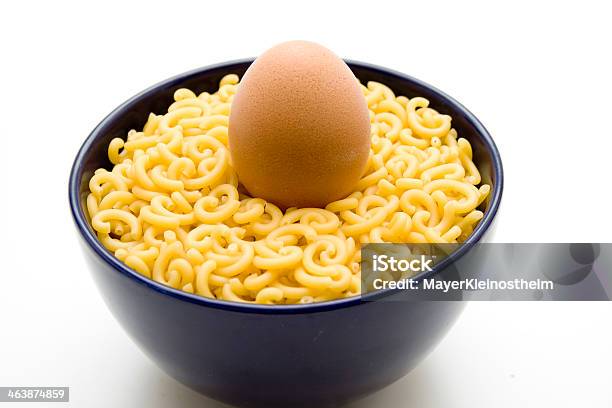Elbow Pasta With Egg In Blue Bowl Stock Photo - Download Image Now - Blue, Bowl, Egg - Food