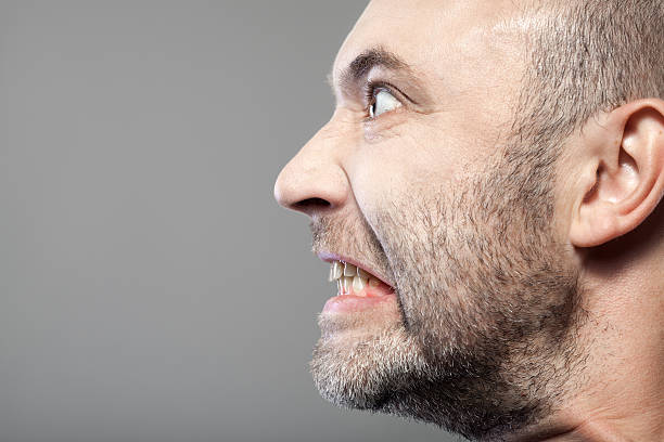 istock portrait of angry man isolated on gray background with copyspace 463875405