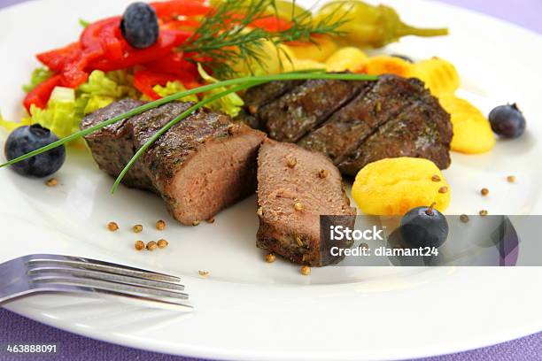 Lamb Steak With Gnocchi Red Peppers And Spices Stock Photo - Download Image Now - Beef, Blueberry, Braised