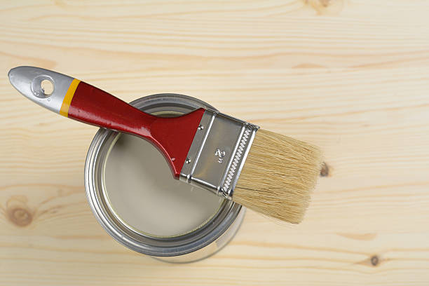 istock Paintbrush and a can with paint 463890781