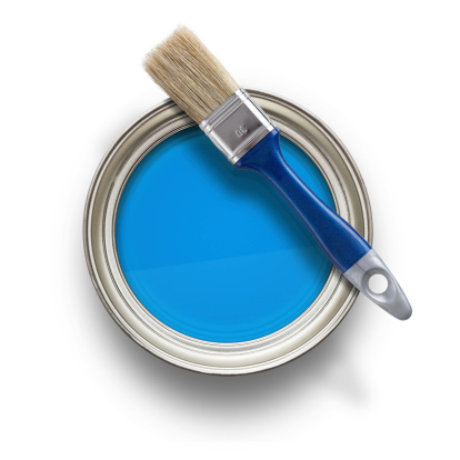 High angle view of blue paint can with brush isolated on white background