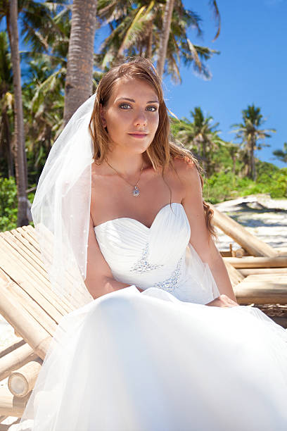 istock Beautiful bride on tropical beach 463928223