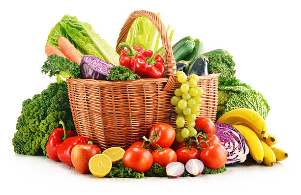 istock Wicker basket with assorted organic vegetables and fruits  isola 463942939