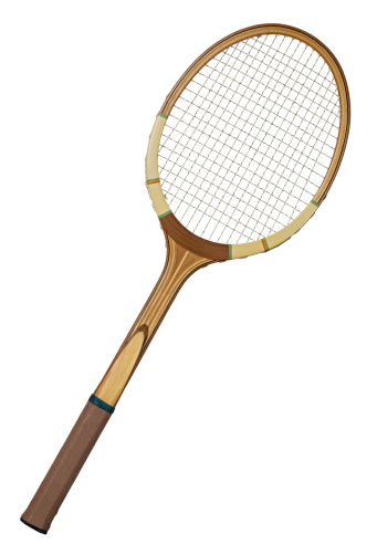 Old wooden tennis racket isolated on white background