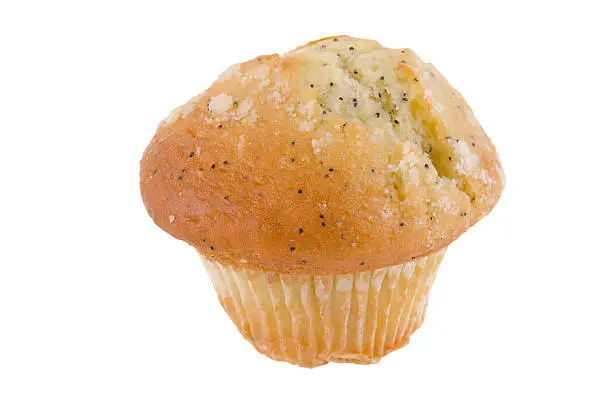 Lemon poppy seed muffin, isolated on white background.